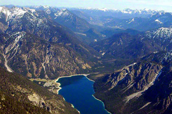 Helicopter sightseeing flight Alps Plansee Zugspitze helicopter flight