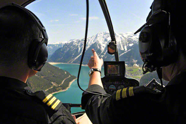 Helicopter sightseeing flight Alps Plansee pilots helicopter flight