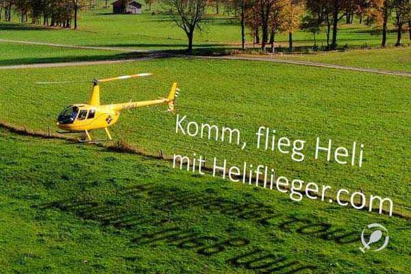 hubschrauberflug gelber r44 heliflieger hubschrauber mit logo aachen rundflug