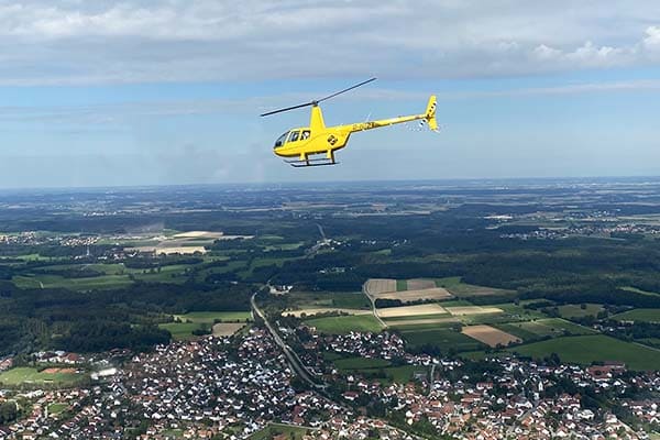 helicopter flies over the odenwald